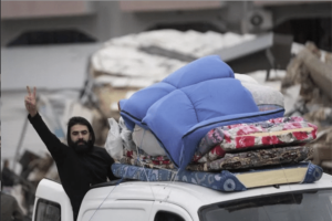 A displaced resident reacts as he returns to his village following the ceasefire between Israel and Hezbollah. Residents are returning to the south. – Photo by AP